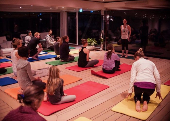 Emerald river cruise yoga class by Tara Gillen photography