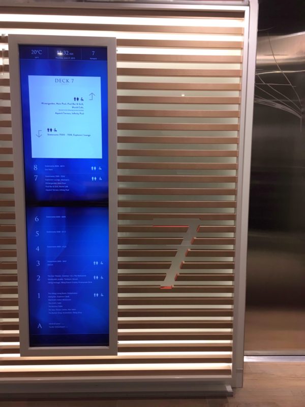 designer signage in wood on Viking Jupiter lift lobby