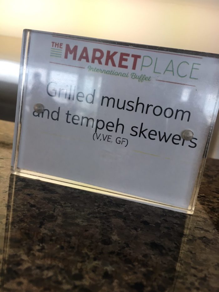 Marella vegan food tempeh skewer sign in buffet